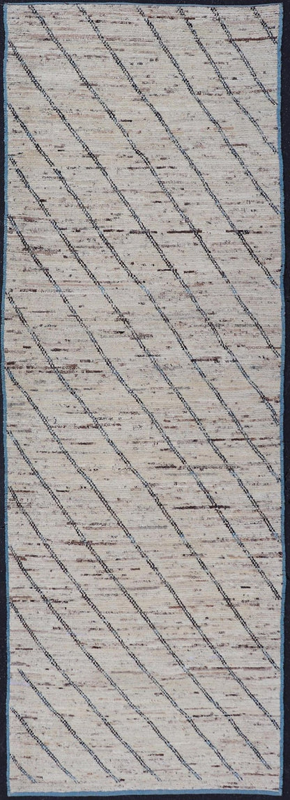 Modern Hand - Knotted Runner in Wool with Slanted Linear Design in Earthy Tones This modern casual tribal rug has been hand - knotted. The rug features a modern linear design, rendered in earthy tones and blues, making this rug a superb fit for a va... - Keivan Woven ArtsAFG - 41031 - 19466Rug