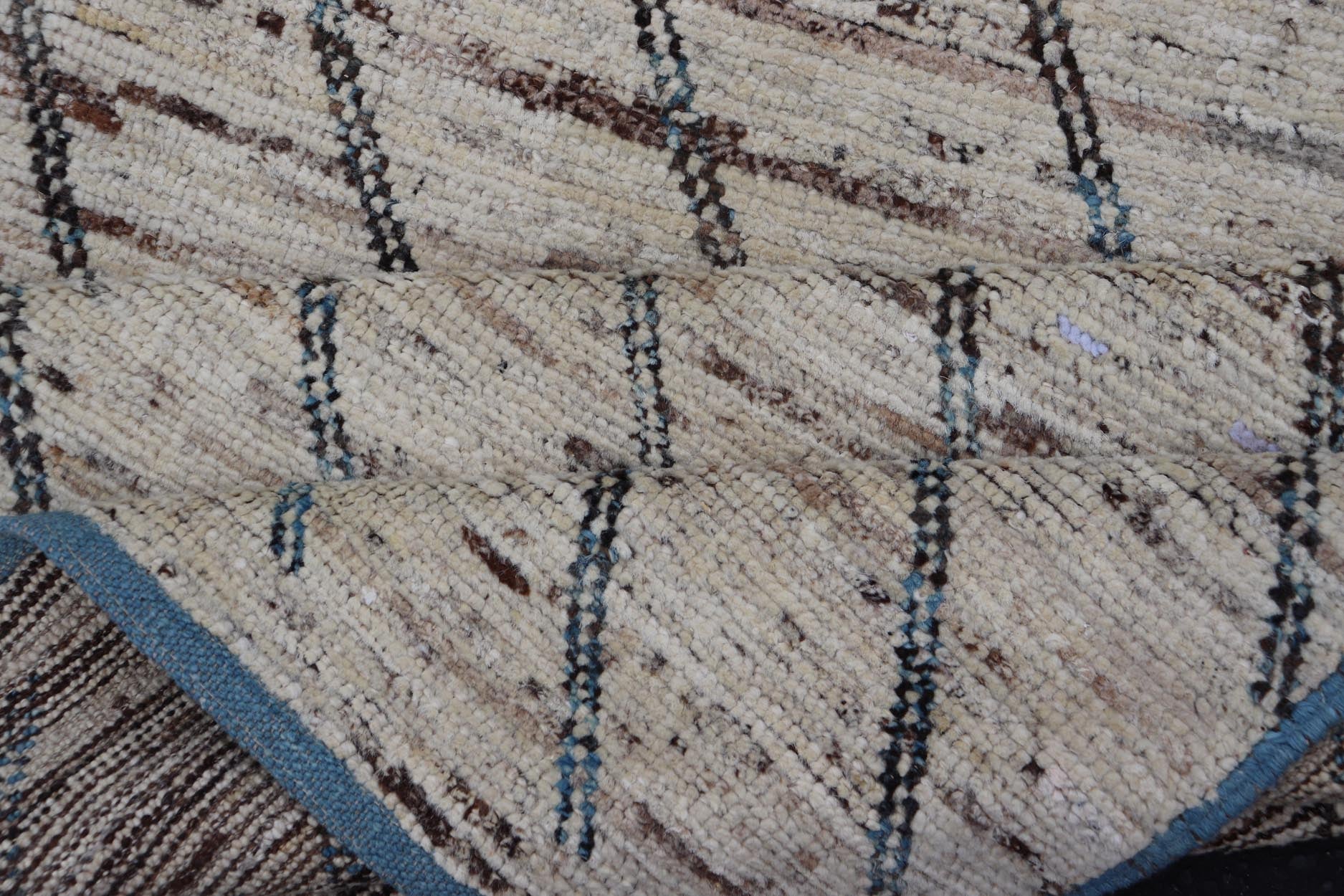 Modern Hand - Knotted Runner in Wool with Slanted Linear Design in Earthy Tones This modern casual tribal rug has been hand - knotted. The rug features a modern linear design, rendered in earthy tones and blues, making this rug a superb fit for a va... - Keivan Woven ArtsAFG - 41031 - 19466Rug