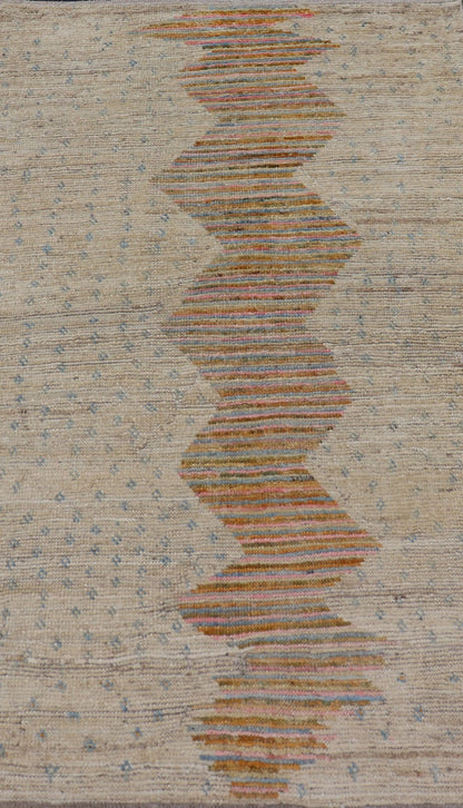 Afghan Modern Casual Hand - Woven in Sand, Mustard, Blue and Pink This contemporary piece displays a sandy background with little blue flecks. The design is a modern zig zag design through the face, opening up to a sandy taupe background and finel... - Keivan Woven ArtsAFG - 43423 - 20259Rug