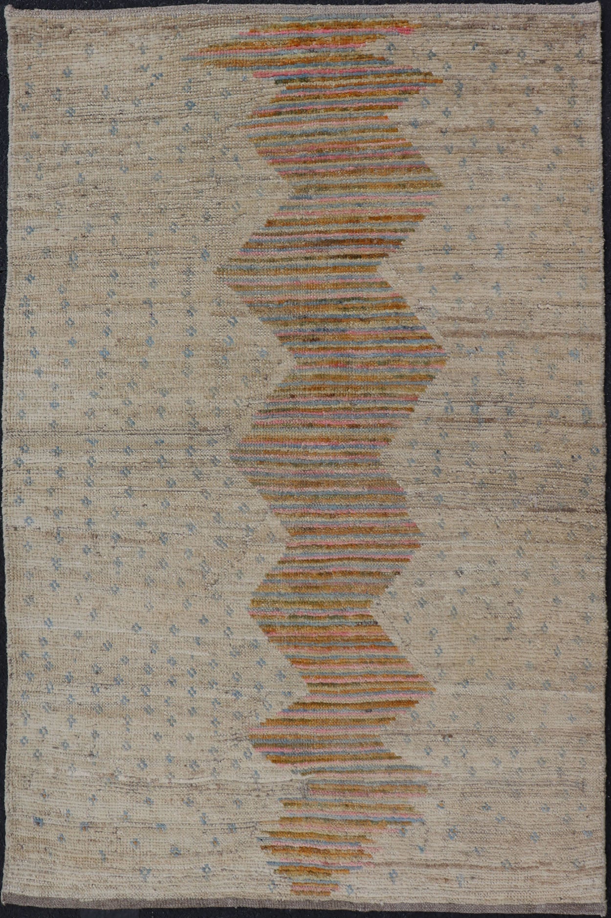 Afghan Modern Casual Hand - Woven in Sand, Mustard, Blue and Pink This contemporary piece displays a sandy background with little blue flecks. The design is a modern zig zag design through the face, opening up to a sandy taupe background and finel... - Keivan Woven ArtsAFG - 43423 - 20259