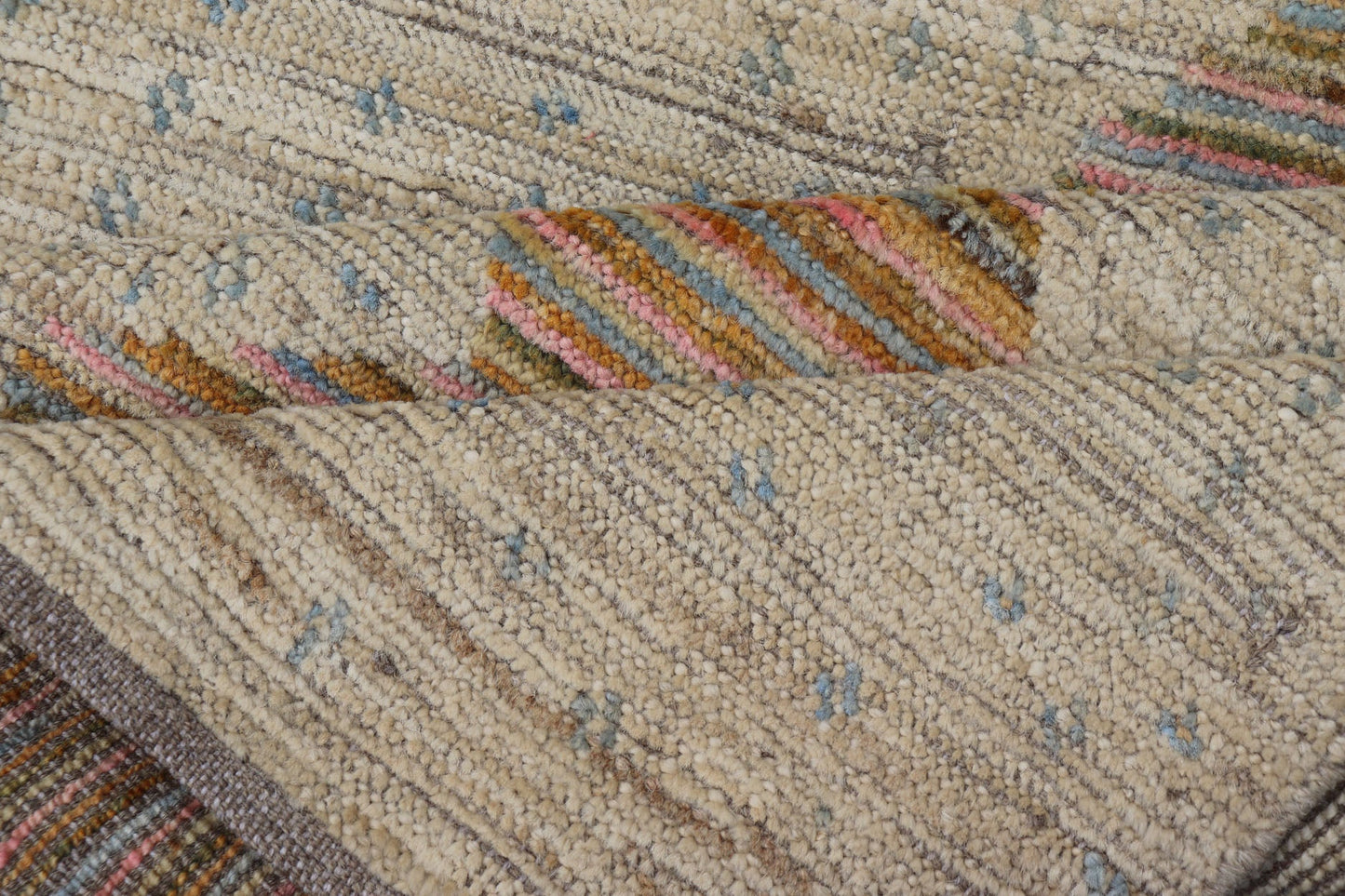 Afghan Modern Casual Hand - Woven in Sand, Mustard, Blue and Pink This contemporary piece displays a sandy background with little blue flecks. The design is a modern zig zag design through the face, opening up to a sandy taupe background and finel... - Keivan Woven ArtsAFG - 43423 - 20259Rug