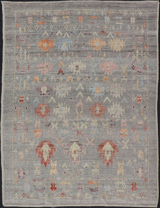Modern Casual Afghan Hand - Knotted Wool Rug in Taupe Measures: 4'5 x 6'3 This charismatic piece holds much personality in the all - over design of motifs. The tribal - like motifs are rendered in red, beige, pink, blue and small accents of ap... - Keivan Woven ArtsAFG - 43425 - 20253