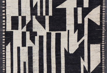 Ebony and Ivory Oversized Abstract Modern Casual This oversized modern casual was hand - knotted in Afghanistan. The field portrays an ivory background disrupted by flashes of ebony abstractions. The small simple border has a crafty ivory embr... - Keivan Woven ArtsAFG - 43436 - 20247Rug
