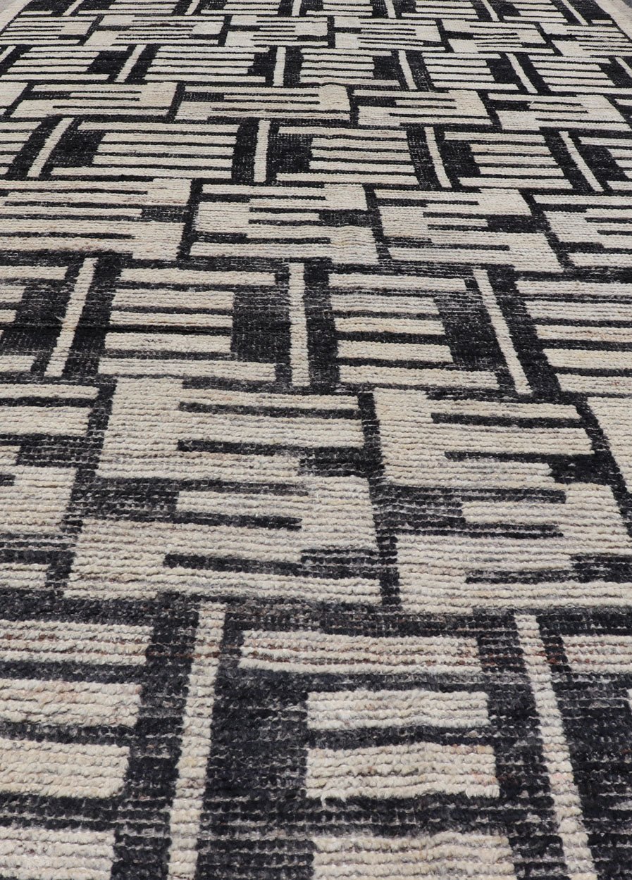 Sub - Geometric Afghan Abstract All - Over Modern Design in Ebony and Ivory This Afghan hand - knotted area rug features an abstract, all - over design in ivory. The background is rich with ebony, while the design and border each di... - Keivan Woven ArtsAFG - 43438 - 20211Rug
