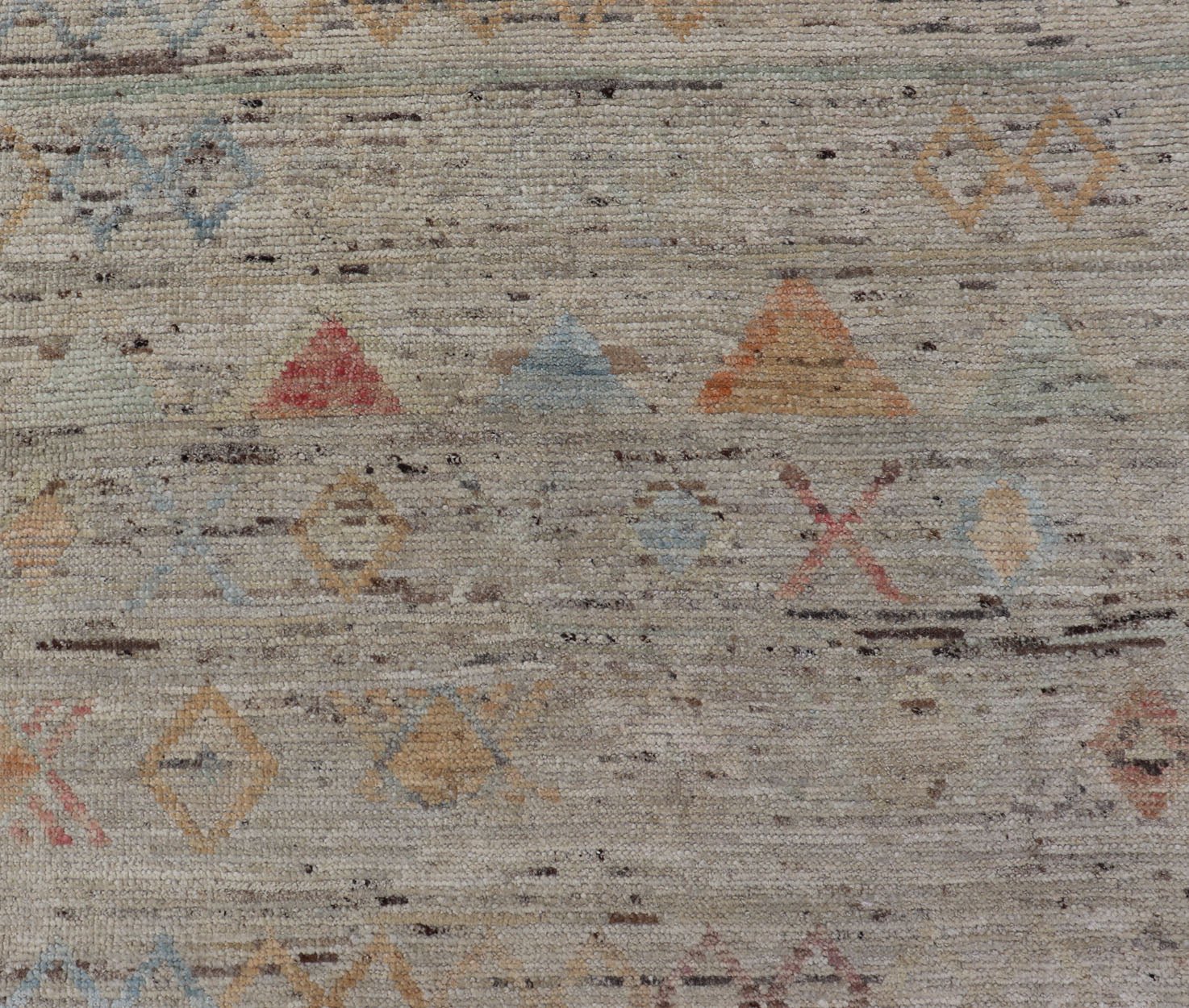 Large Modern Casual Area Rug in Sandy Tones With Pops of Color This elegant modern casual was hand - knotted in Afghanistan. The large open field displays tribal - like motifs atop of warm - yet - subtle sandy hues of beige and light taupe. The des... - Keivan Woven ArtsAFG - 43448 - 20217Rug