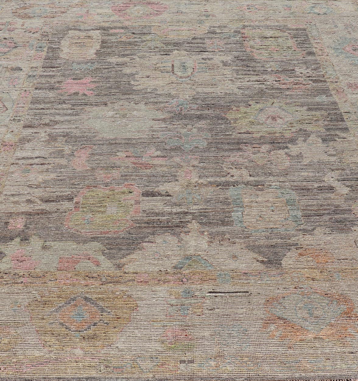 Modern Distressed Oushak in Large Floral Design on Brown Field and Tan Border, Keivan Woven Arts /rug AFG - 58300 Country of Origin: Afghanistan Type: Oushak Design: Floral, All - Over, Arabesque - Floral 21st century Measures: 8'11 x 11'6 Modern Oush... - Keivan Woven ArtsAFG - 58300 - 21233Rug