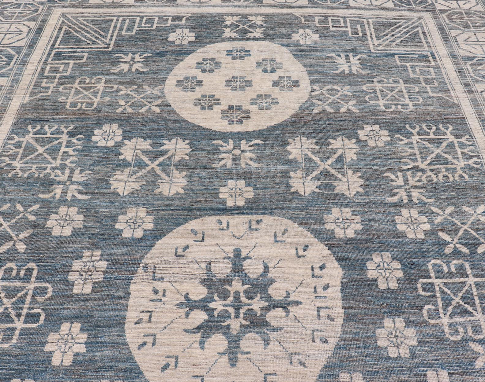 Modern Khotan Long Rug with Circular Medallions in Shades Of Steel Blue & Off White. Keivan Woven Arts rug AFG - 58337, Keivan Woven Arts / country of origin / type: Afghanistan / Khotan Measures: 10'6 x 16'3 This modern Khotan made rug fe... - Keivan Woven ArtsAFG - 58337 - 21457Rug