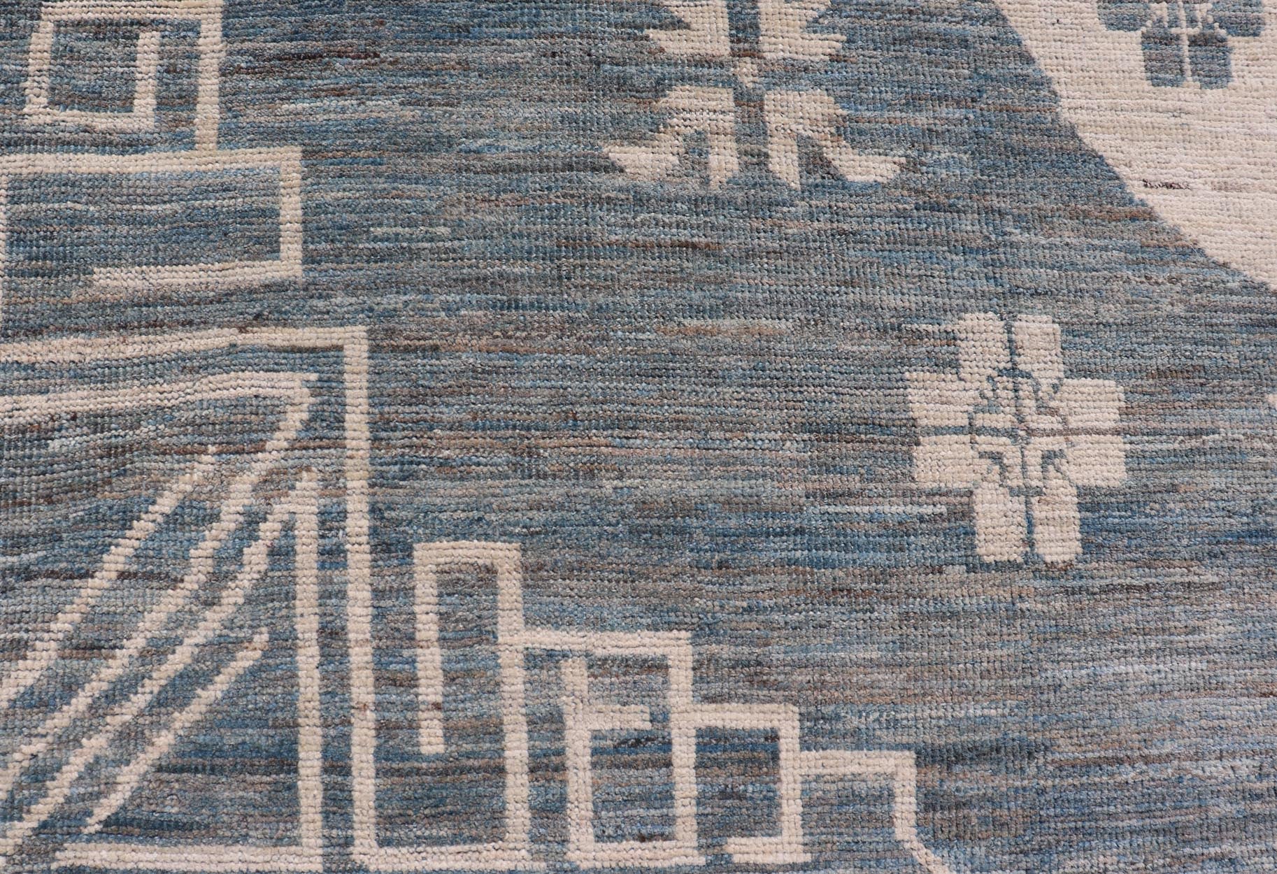 Modern Khotan Long Rug with Circular Medallions in Shades Of Steel Blue & Off White. Keivan Woven Arts rug AFG - 58337, Keivan Woven Arts / country of origin / type: Afghanistan / Khotan Measures: 10'6 x 16'3 This modern Khotan made rug fe... - Keivan Woven ArtsAFG - 58337 - 21457Rug