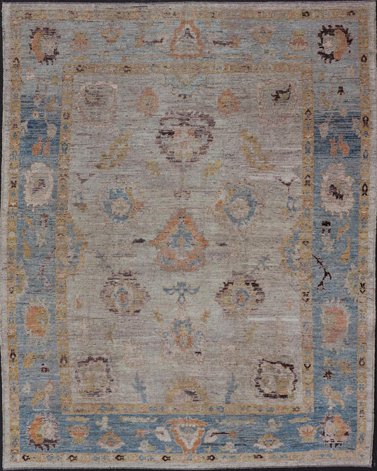 Large Floral Designed Modern Oushak on a Cream Field and Light Blue Border. Keivan Woven Arts rug / AFG - 64120 Country of Origin: Afghanistan Type: Oushak Design: Floral, All - Over, Arabesque - Floral 21st century. Measures: 10'5 x 13'10 Modern Ous... - Keivan Woven ArtsAFG - 64120 - 24806Rug