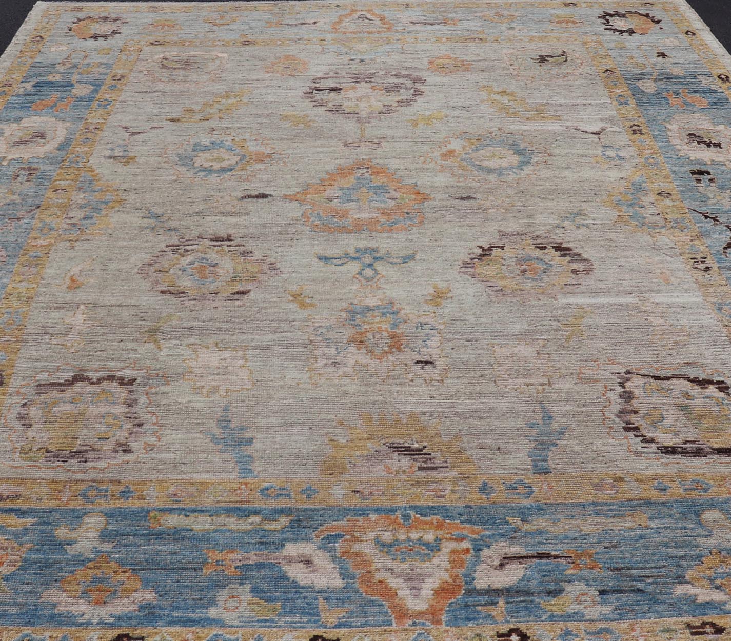 Large Floral Designed Modern Oushak on a Cream Field and Light Blue Border. Keivan Woven Arts rug / AFG - 64120 Country of Origin: Afghanistan Type: Oushak Design: Floral, All - Over, Arabesque - Floral 21st century. Measures: 10'5 x 13'10 Modern Ous... - Keivan Woven ArtsAFG - 64120 - 24806Rug