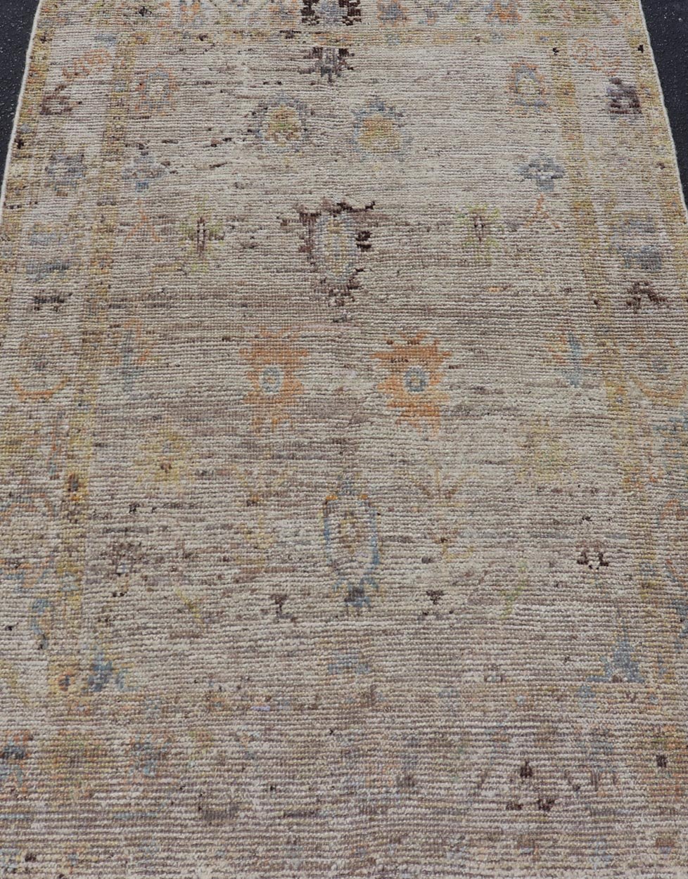 Modern Distressed Oushak With All - Over Floral Design on Cream Field and Border. Keivan Woven Arts/ rug /AFG - 65734 Country of Origin: Afghanistan Type: Oushak Design: Floral, All - Over, Arabesque - Floral 21st century. Measures: 3'9 x 5'8 Modern di... - Keivan Woven ArtsAFG - 65734 - 25170Rug