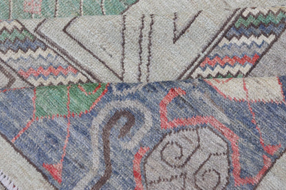 Finely hand knotted Khotan Rug with Circular Medallions in Shades of Purple, light Green, salmon, medium green and Cream. Keivan Woven Arts / rug AFG - 67298, country of origin / type: Afghanistan / Khotan. Measures: 9'8 x 13' This modern... - Keivan Woven ArtsAFG - 67298 - 24547Rugs
