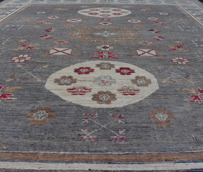 Modern Khotan Rug with Circular Medallions in Shades of Gray, Red, and Brown. Keivan Woven Arts rug AFG - 67300 / country of origin / type: Afghanistan / Khotan. Measures: 9'6 x 11'9 This modern Khotan made rug features Samarkand design with mult... - Keivan Woven ArtsAFG - 67300 - 24541Rugs