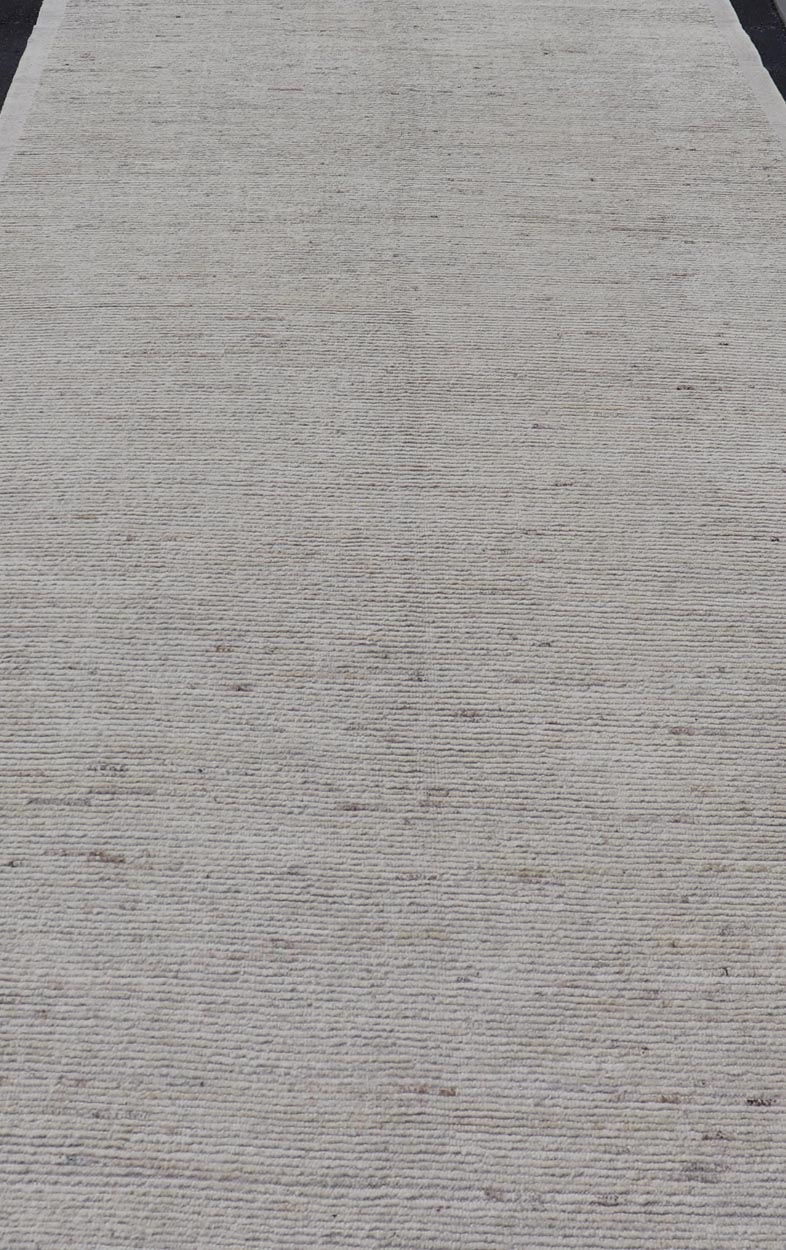 Modern Casual Gallery Runner in Neutral Tones with Shades of Cream to Ivory. Keivan Woven Arts rug AFG - 67941, country of origin / type: Afghanistan / Pile 21st Century. Measures: 7'0 x 18'4 This large gallery runner makes it perfect for modern ... - Keivan Woven ArtsAFG - 67941 - 25176Rug