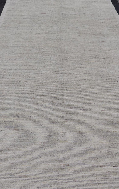 Modern Casual Gallery Runner in Neutral Tones with Shades of Cream to Ivory. Keivan Woven Arts rug AFG - 67941, country of origin / type: Afghanistan / Pile 21st Century. Measures: 7'0 x 18'4 This large gallery runner makes it perfect for modern ... - Keivan Woven ArtsAFG - 67941 - 25176Rug