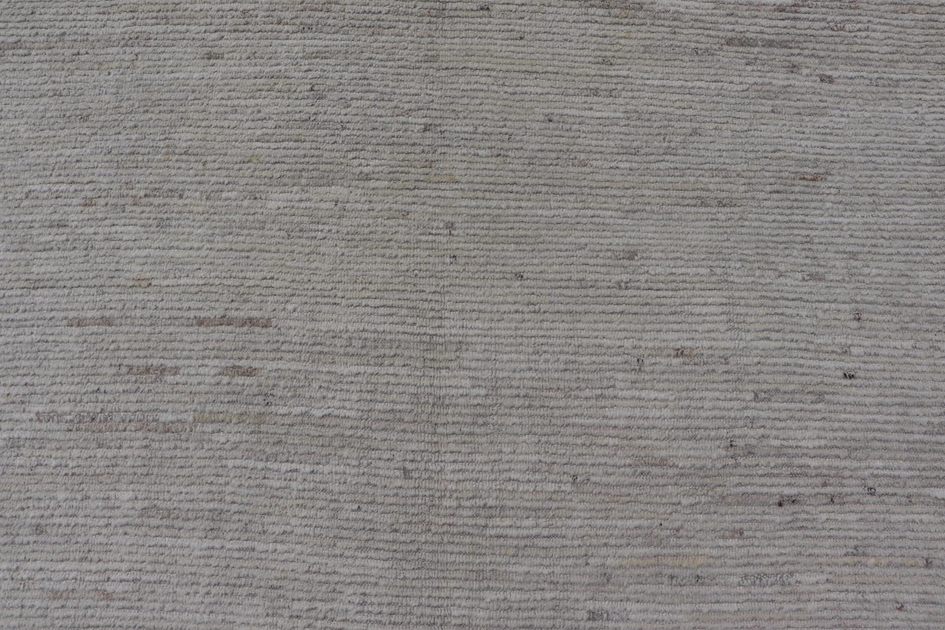 Modern Casual Gallery Runner in Neutral Tones with Shades of Cream to Ivory. Keivan Woven Arts rug AFG - 67941, country of origin / type: Afghanistan / Pile 21st Century. Measures: 7'0 x 18'4 This large gallery runner makes it perfect for modern ... - Keivan Woven ArtsAFG - 67941 - 25176Rug