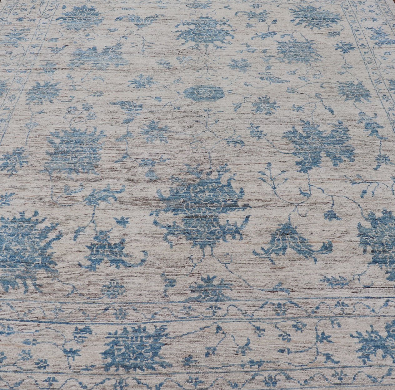 Measures: 9'5 x 12'1 Keivan Woven Arts Modern Oushak rug in light blue and off white. Keivan Woven Arts / rug AFGC - 39485 Early 21st Century. This Keiva Woven Arts Oushak design rug has been made with light blue and off white colors. This is... - Keivan Woven ArtsAFGC - 39485 - 18311Rug