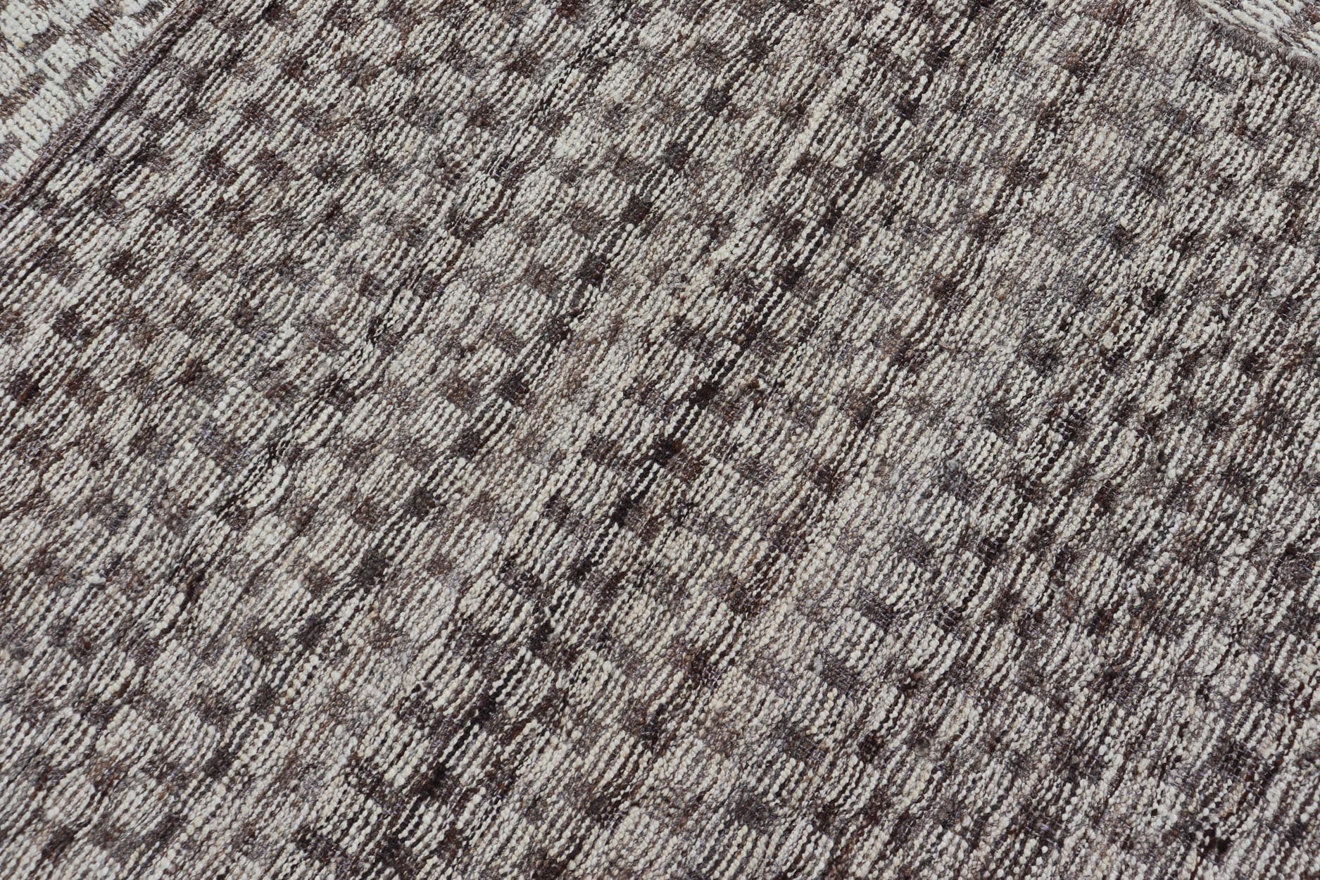 Modern Hand - Knotted Rug in Wool with All - Over Geometric Checkerboard Design This modern casual tribal rug has been hand - knotted. The rug features a modern all - over geometric checkerboard - like design, rendered in brown, cream, taupe, and gray ton... - Keivan Woven ArtsAFGC - 39754 - 19520Rug