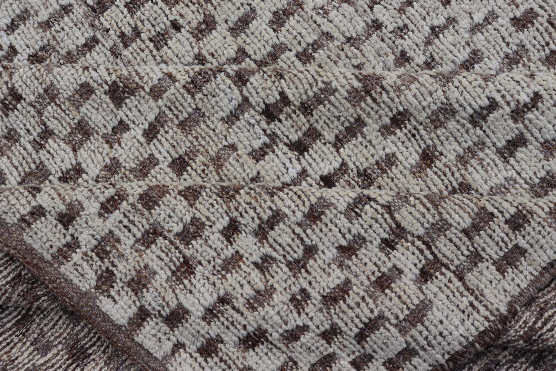 Modern Hand - Knotted Rug in Wool with All - Over Geometric Checkerboard Design This modern casual tribal rug has been hand - knotted. The rug features a modern all - over geometric checkerboard - like design, rendered in brown, cream, taupe, and gray ton... - Keivan Woven ArtsAFGC - 39754 - 19520Rug