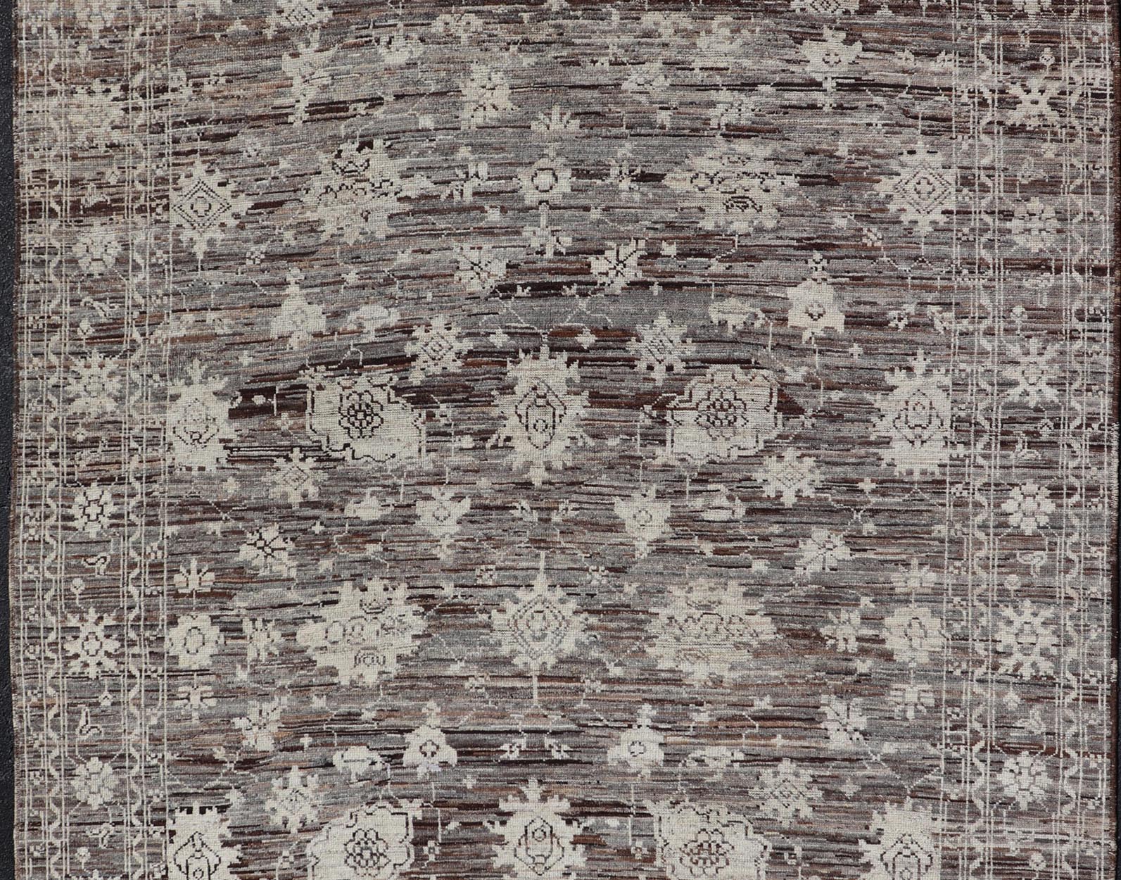 Modern Hand - Knotted Rug in Wool with Sub - Geometric Floral Oushak Design This modern casual rug has been hand - knotted. The rug features a modern sub - geometric Oushak design, replete with various motifs, the rug is rendered in earthy and neutral t... - Keivan Woven ArtsAFGC - 39775 - 17110Rug