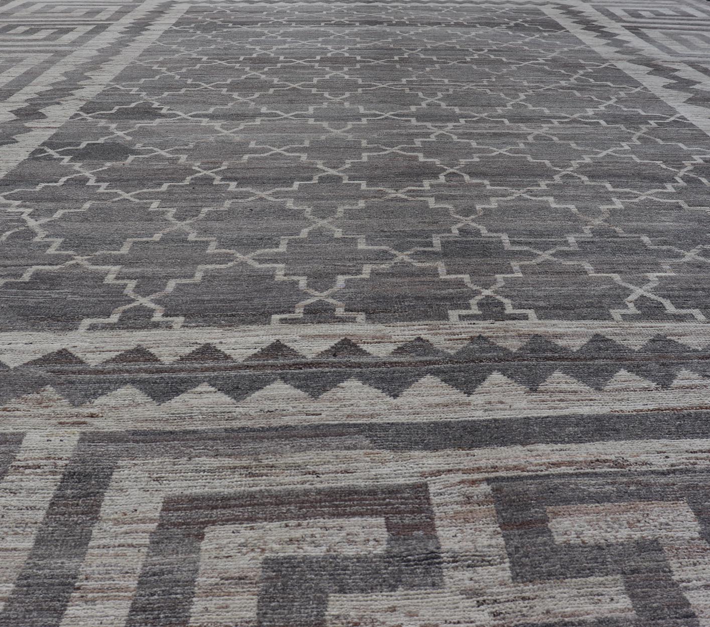 Modern Hand - Knotted Khotan Rug in Wool with Sub - Geometric & Greek Key Design This modern casual Khotan rug has been hand - knotted. The rug features a modern sub - geometric diamond design, enclosed within a Greek key design border; making this rug... - Keivan Woven ArtsAFGC - 39807 - 19376Rug