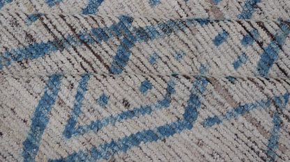 Modern Hand - Knotted Tribal Rug in Wool with Sub - Geometric Design in Blue & Ivory This modern casual tribal rug has been hand - knotted. The rug features a modern sub - geometric diamond design, replete with various motifs, rendered in blue and ivor... - Keivan Woven ArtsAFGC - 40822 - 19418Rug