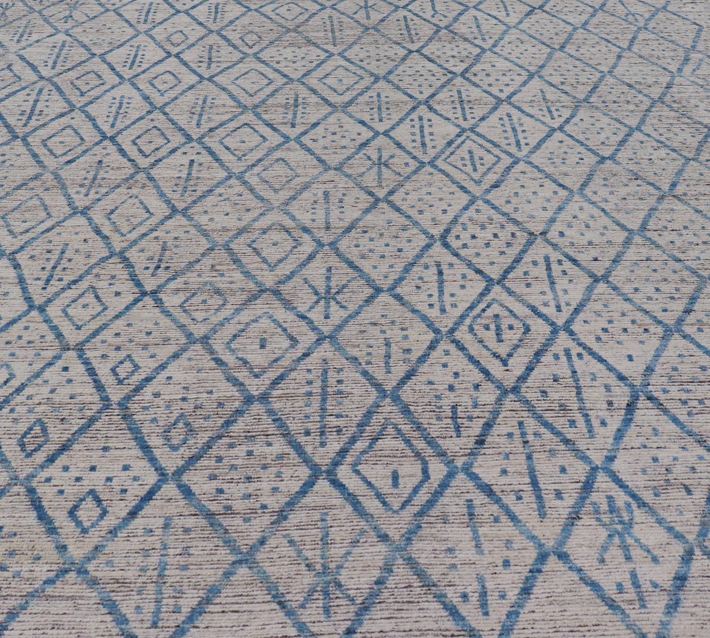 Modern Hand - Knotted Tribal Rug in Wool with Sub - Geometric Design in Blue & Ivory This modern casual tribal rug has been hand - knotted. The rug features a modern sub - geometric diamond design, replete with various motifs, rendered in blue and ivor... - Keivan Woven ArtsAFGC - 40822 - 19418Rug