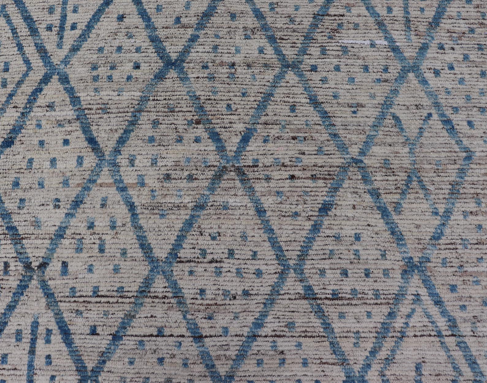 Modern Hand - Knotted Tribal Rug in Wool with Sub - Geometric Design in Blue & Ivory This modern casual tribal rug has been hand - knotted. The rug features a modern sub - geometric diamond design, replete with various motifs, rendered in blue and ivor... - Keivan Woven ArtsAFGC - 40822 - 19418Rug