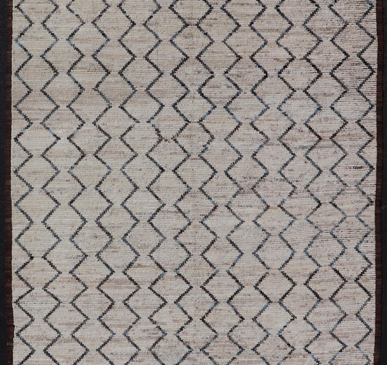 Modern Hand - Knotted Gallery Rug in Wool with Geometric Zig - Zag Design This modern casual tribal rug has been hand - knotted. The rug features a modern all - over geometric zig - zag design, rendered in Blue, Charcoal, Brown and Cream; making this ru... - Keivan Woven ArtsAFGC - 43265 - 19478Rug