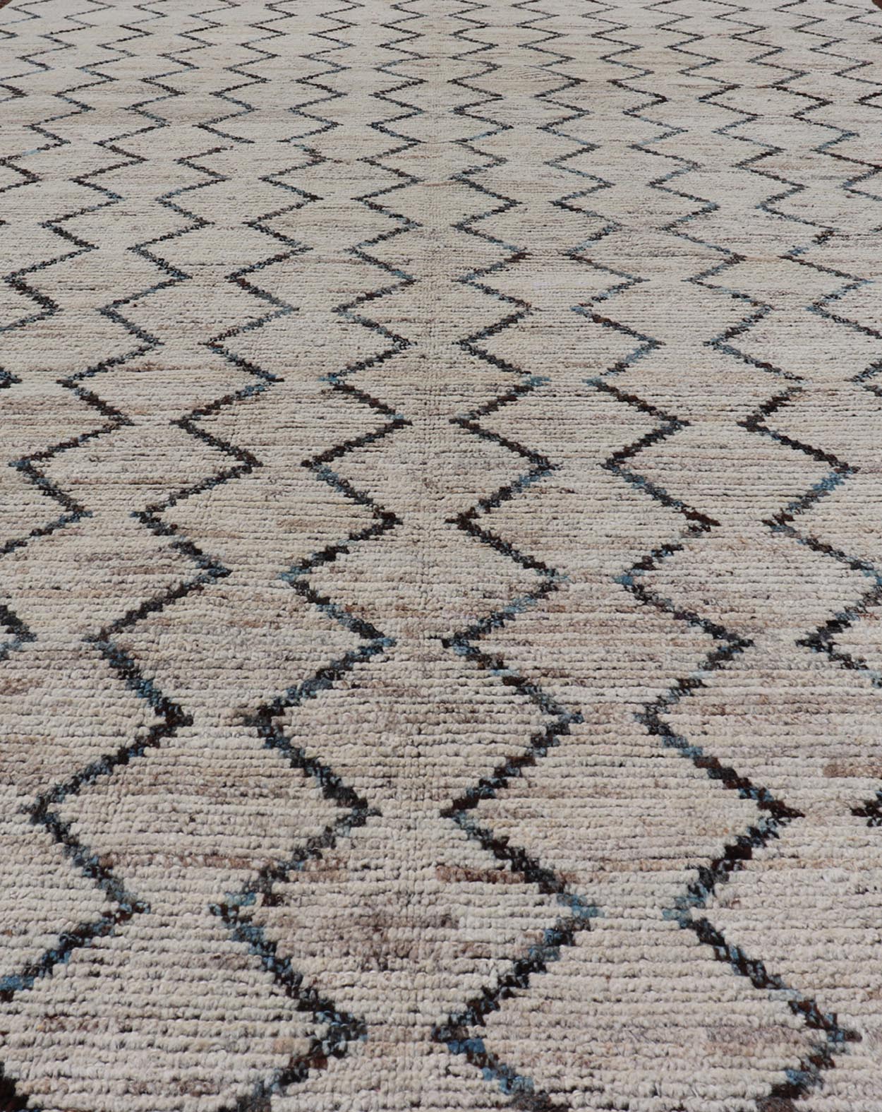 Modern Hand - Knotted Gallery Rug in Wool with Geometric Zig - Zag Design This modern casual tribal rug has been hand - knotted. The rug features a modern all - over geometric zig - zag design, rendered in Blue, Charcoal, Brown and Cream; making this ru... - Keivan Woven ArtsAFGC - 43265 - 19478Rug