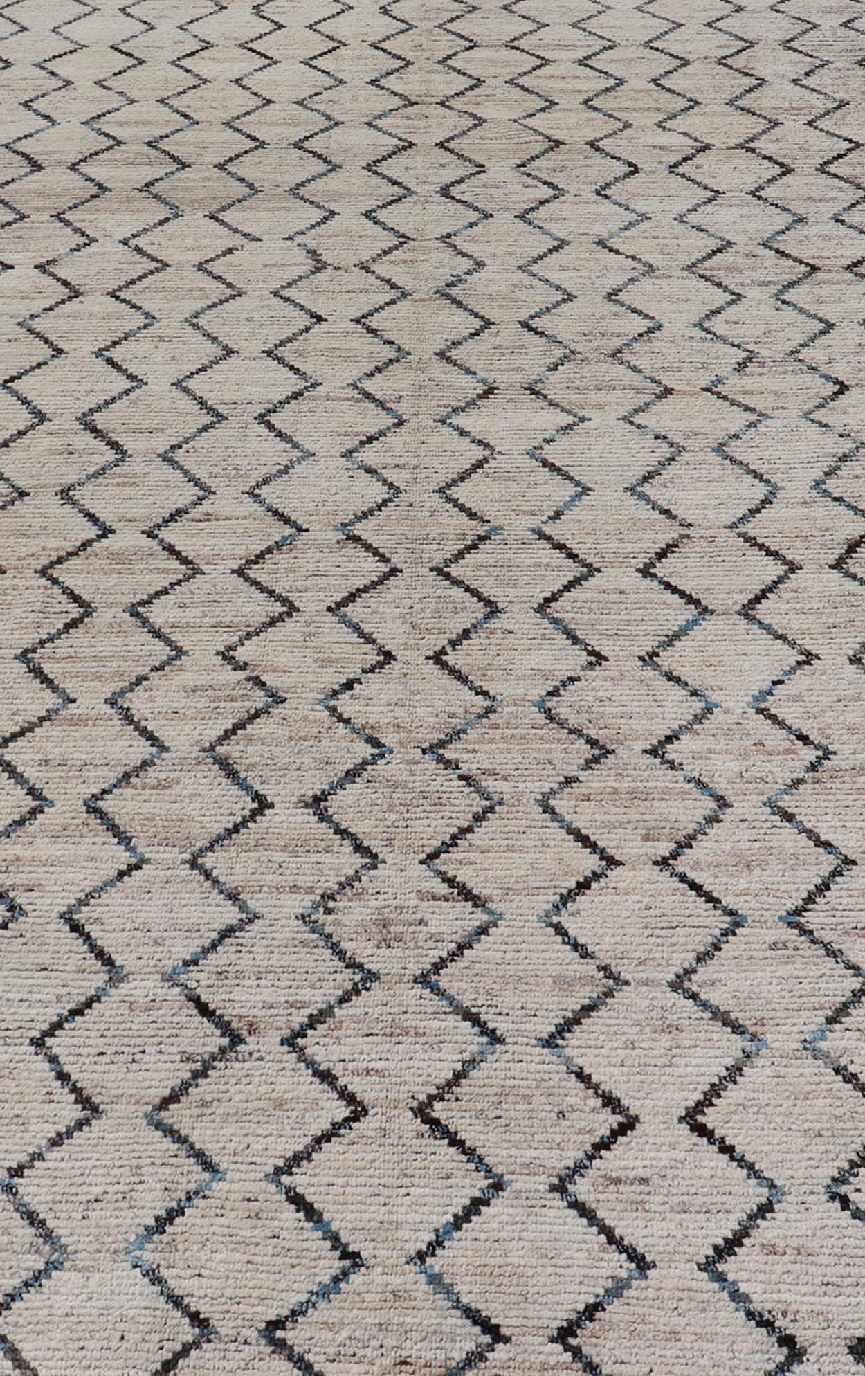 Modern Hand - Knotted Gallery Rug in Wool with Geometric Zig - Zag Design This modern casual tribal rug has been hand - knotted. The rug features a modern all - over geometric zig - zag design, rendered in Blue, Charcoal, Brown and Cream; making this ru... - Keivan Woven ArtsAFGC - 43265 - 19478Rug
