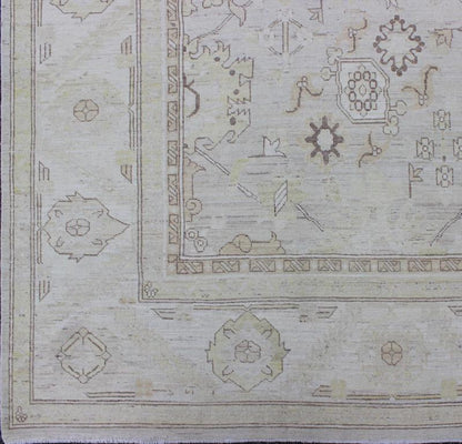 This Afghan made fine rug rug features a transitional design of stylized motifs in the central field, which are flanked by a repeating pattern in the border. The entirety of the piece is rendered in light tones, which makes it a versatile rug, well - sui... - Keivan Woven ArtsAIA - 151 - 6422Rug