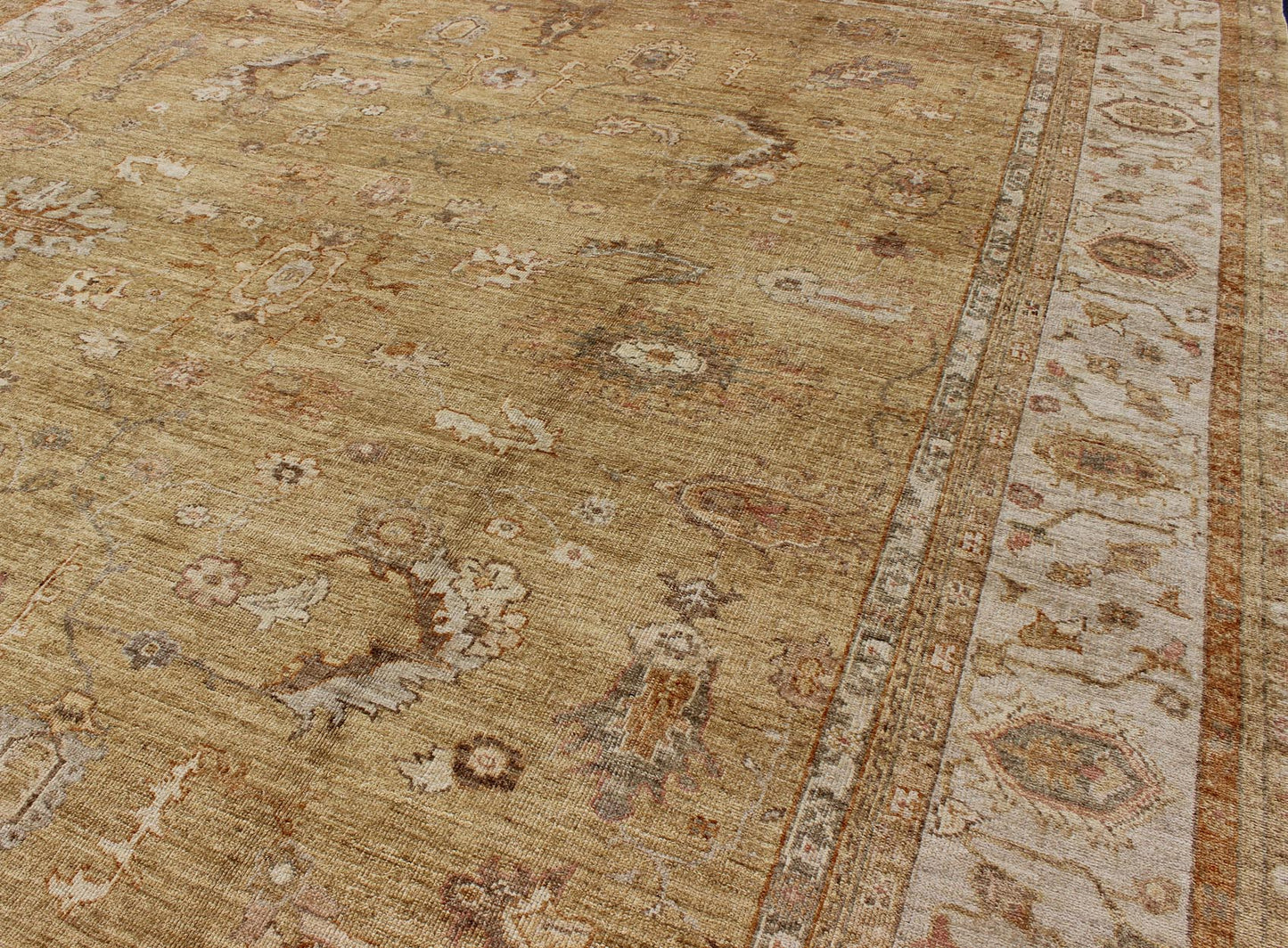 Large Angora Oushak Turkish Rug in Warm Colors of Taupe, Soft Gold, Brown, Cream. This beautiful taupe/gold color Oushak is made with a combination of angora wool and old wool. Featuring all organic materials, the Angora Collection is a modern - d... - Keivan Woven ArtsAN - 104988 - 6568Rug