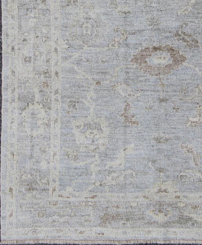 Angora Oushak Turkish Gallery Rug in Shades of Light Blue, Silver and Taupe. From our Angora collection, this piece is made with a combination of angora and old wool. Featuring all organic materials, the Angora collection is a modern - day remake of ... - Keivan Woven ArtsAN - 123329 - 6600Rug
