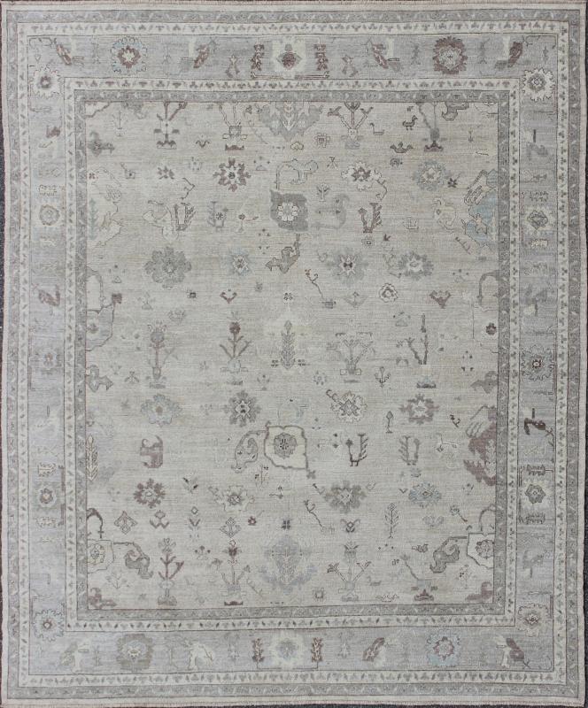 Large Turkish Oushak Rug with Floral Bouquet Motifs in Gray, Taupe & Lavender: Made with a combination of angora and old wool, this magnificent vintage Turkish Oushak boasts an all - over design in a large - scale style. The plentiful floral and bouquet mo... - Keivan Woven ArtsAN - 123660 - 7028Rug
