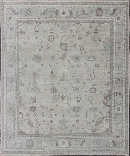 Large Turkish Oushak Rug with Floral Bouquet Motifs in Gray, Taupe & Lavender: Made with a combination of angora and old wool, this magnificent vintage Turkish Oushak boasts an all - over design in a large - scale style. The plentiful floral and bouquet mo... - Keivan Woven ArtsAN - 123660 - 7028Rug
