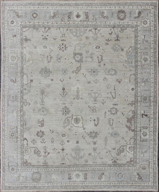 Large Turkish Oushak Rug with Floral Bouquet Motifs in Gray, Taupe & Lavender: Made with a combination of angora and old wool, this magnificent vintage Turkish Oushak boasts an all - over design in a large - scale style. The plentiful floral and bouquet mo... - Keivan Woven ArtsAN - 123660 - 7028