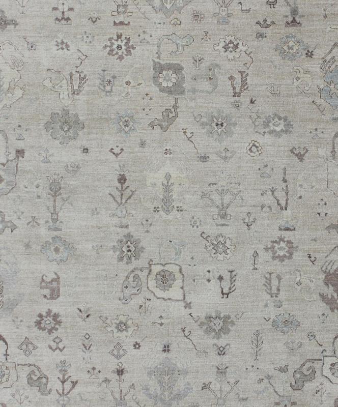 Large Turkish Oushak Rug with Floral Bouquet Motifs in Gray, Taupe & Lavender: Made with a combination of angora and old wool, this magnificent vintage Turkish Oushak boasts an all - over design in a large - scale style. The plentiful floral and bouquet mo... - Keivan Woven ArtsAN - 123660 - 7028Rug