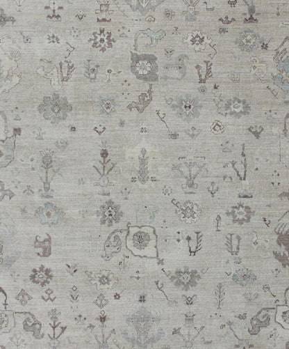 Large Turkish Oushak Rug with Floral Bouquet Motifs in Gray, Taupe & Lavender: Made with a combination of angora and old wool, this magnificent vintage Turkish Oushak boasts an all - over design in a large - scale style. The plentiful floral and bouquet mo... - Keivan Woven ArtsAN - 123660 - 7028Rug
