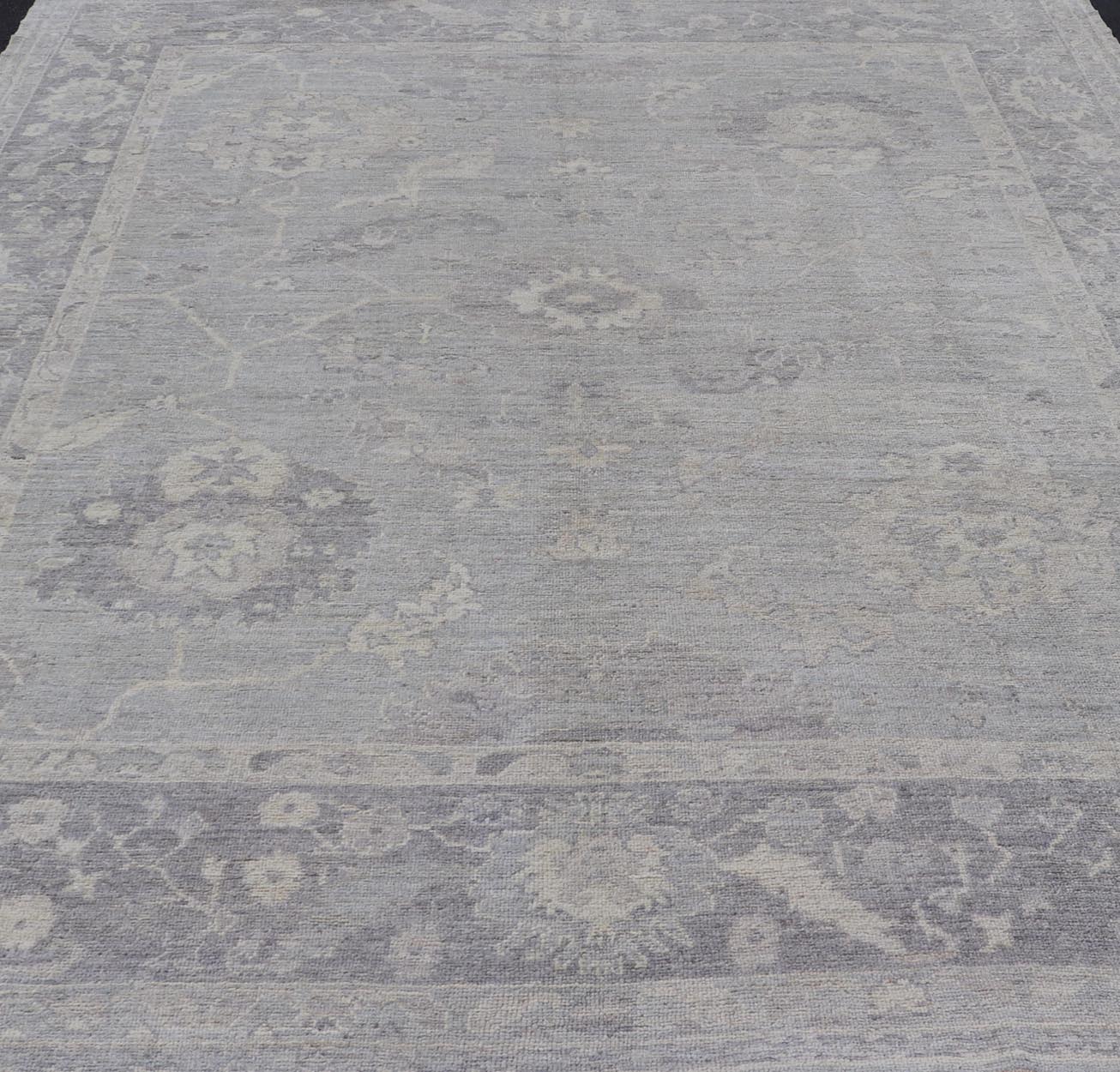 Large Hand Knotted Turkish Oushak with Floral Motifs in Gray, Taupe & Lavender Large Hand Knotted Turkish Oushak with Floral Motifs in Gray, Taupe & Lavender Keivan Woven Arts/ rug /AN - 146929 Early 21st century Made with a combinat... - Keivan Woven ArtsAN - 146929 - 19304Rug