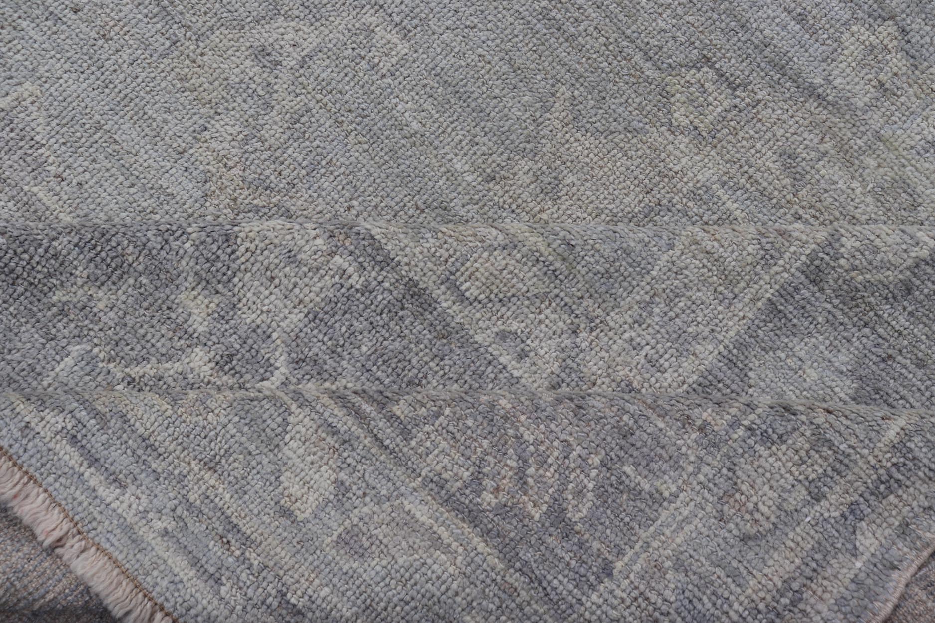 Large Hand Knotted Turkish Oushak with Floral Motifs in Gray, Taupe & Lavender Large Hand Knotted Turkish Oushak with Floral Motifs in Gray, Taupe & Lavender Keivan Woven Arts/ rug /AN - 146929 Early 21st century Made with a combinat... - Keivan Woven ArtsAN - 146929 - 19304Rug