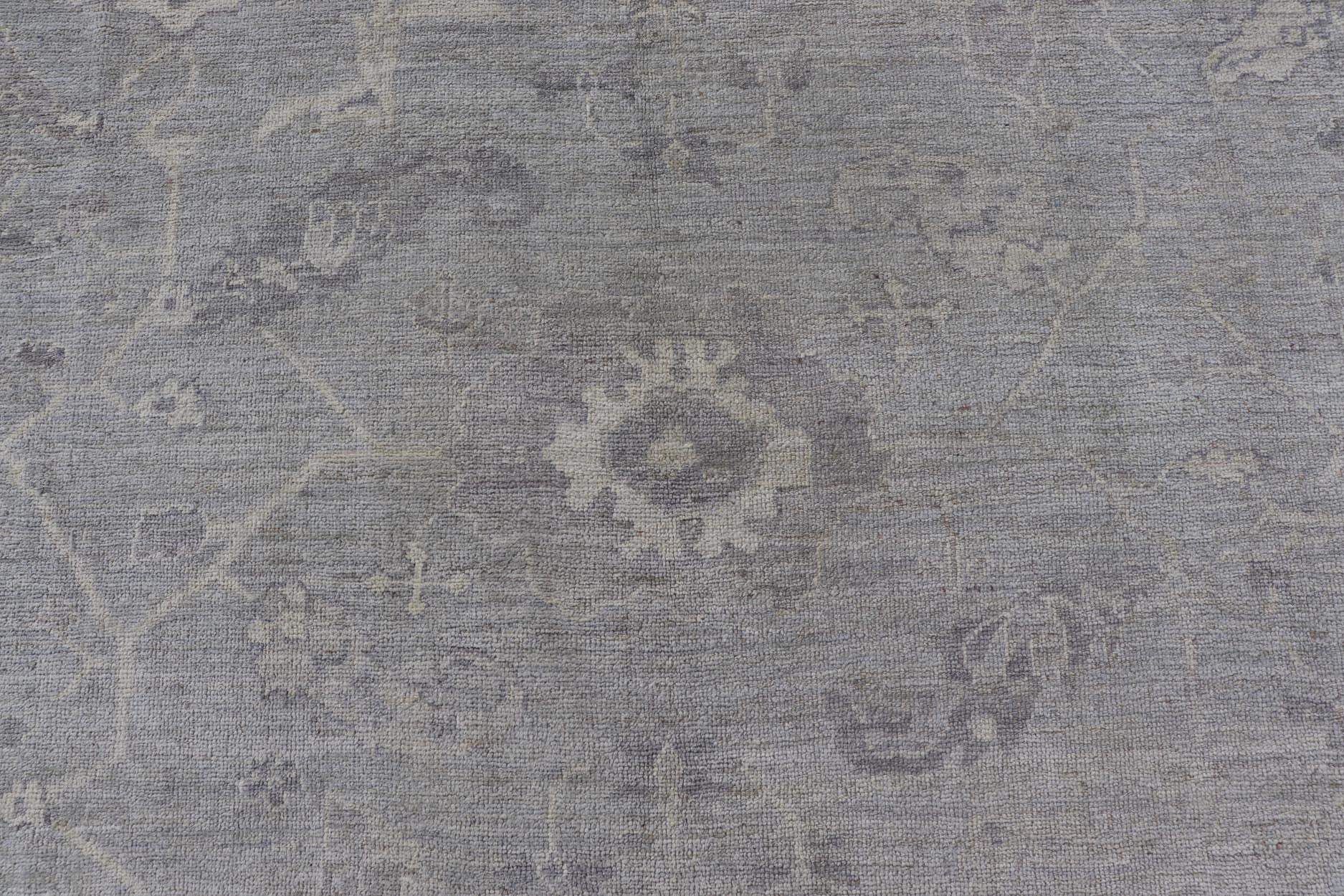 Large Hand Knotted Turkish Oushak with Floral Motifs in Gray, Taupe & Lavender Large Hand Knotted Turkish Oushak with Floral Motifs in Gray, Taupe & Lavender Keivan Woven Arts/ rug /AN - 146929 Early 21st century Made with a combinat... - Keivan Woven ArtsAN - 146929 - 19304Rug