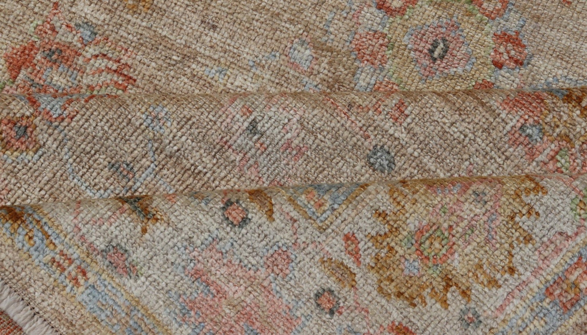 Turkish Oushak Floral Design with Color on A Taupe Field and Ivory Border This hand - knotted Oushak has a sub - floral Oushak design that spreads on the the field, rendered in coral, salmon, light blue, gold, and green. The background of the field... - Keivan Woven ArtsAN - 149322 - 19923Rug