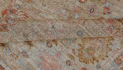 Turkish Oushak Floral Design with Color on A Taupe Field and Ivory Border This hand - knotted Oushak has a sub - floral Oushak design that spreads on the the field, rendered in coral, salmon, light blue, gold, and green. The background of the field... - Keivan Woven ArtsAN - 149322 - 19923Rug