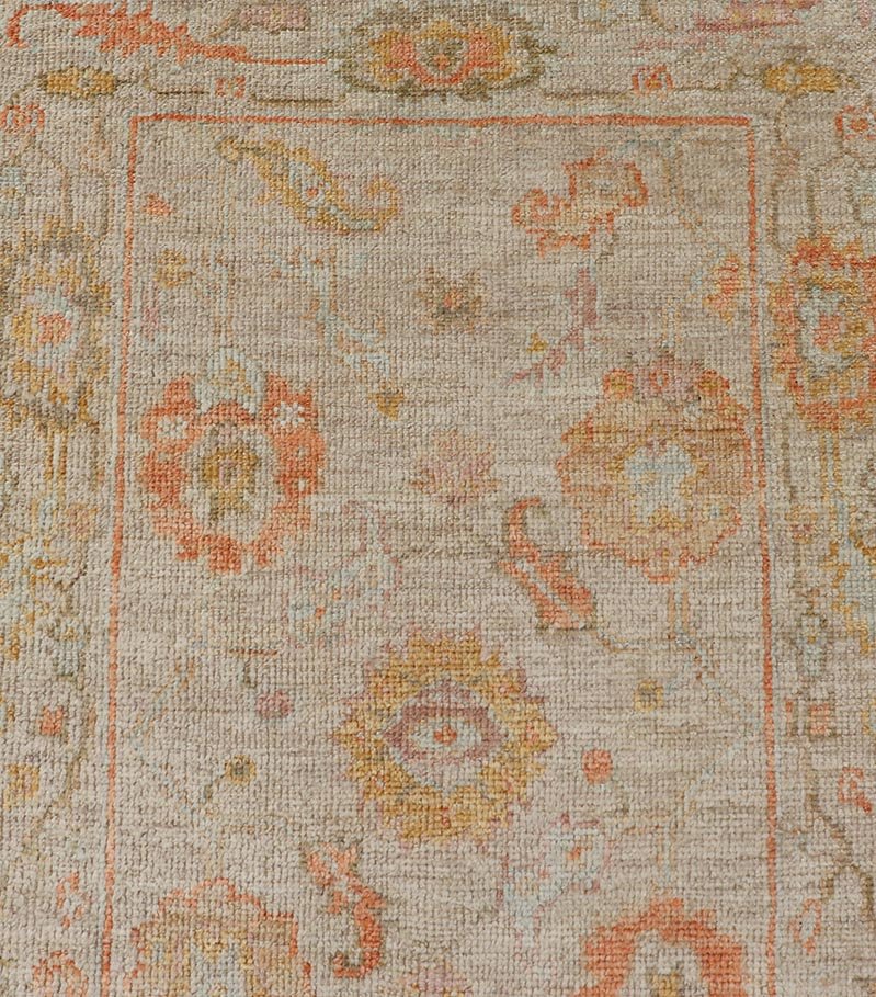 Angora Turkish Oushak Floral Runner in Cream with Pops of Orange, Green and Blue This angora Oushak is unique with is creamy background, to the floral like design rendered in coral, tangerine, forest green, salmon, and hints of sky blue. The bor... - Keivan Woven ArtsAN - 149531 - 19947Rug