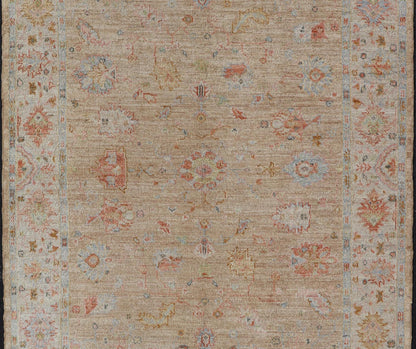 Floral Turkish Angora Oushak with Sandy - Taupe Background and Cream Border This Turkish Oushak was hand - knotted with angora wool. The field's background is rendered in a sandy - taupe, while the border's background is a cream color. The classic Ous... - Keivan Woven ArtsAN - 149571 - 19929Rug
