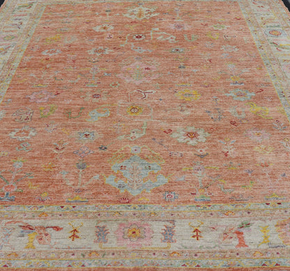 Vibrant Floral Medley on Salmon Pink Hand - Knotted Rug by Keivan Woven Arts. rug / AN - 149682, Turkish 21st Century. Measures: 10'0 x 12'11 The rug showcase's a beautifully woven rug with a vibrant and colorful design on a warm salmon pink backgro... - Keivan Woven ArtsAN - 149682 - 16412Rug