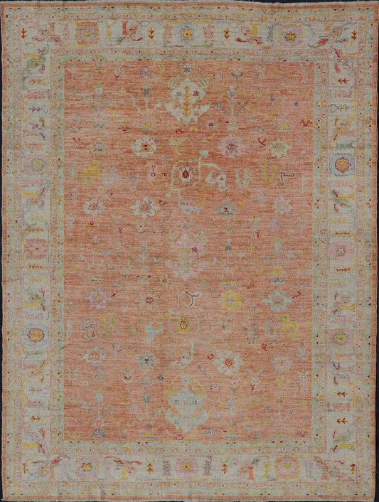 Vibrant Floral Medley on Salmon Pink Hand - Knotted Rug by Keivan Woven Arts. rug / AN - 149682, Turkish 21st Century. Measures: 10'0 x 12'11 The rug showcase's a beautifully woven rug with a vibrant and colorful design on a warm salmon pink backgro... - Keivan Woven ArtsAN - 149682 - 16412Rug