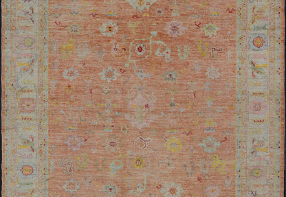 Vibrant Floral Medley on Salmon Pink Hand - Knotted Rug by Keivan Woven Arts. rug / AN - 149682, Turkish 21st Century. Measures: 10'0 x 12'11 The rug showcase's a beautifully woven rug with a vibrant and colorful design on a warm salmon pink backgro... - Keivan Woven ArtsAN - 149682 - 16412Rug