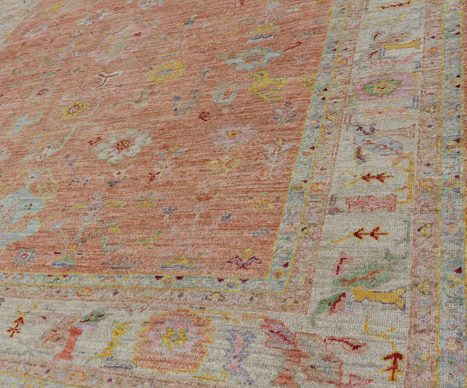 Vibrant Floral Medley on Salmon Pink Hand - Knotted Rug by Keivan Woven Arts. rug / AN - 149682, Turkish 21st Century. Measures: 10'0 x 12'11 The rug showcase's a beautifully woven rug with a vibrant and colorful design on a warm salmon pink backgro... - Keivan Woven ArtsAN - 149682 - 16412Rug